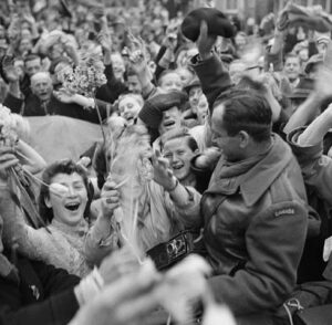 A Canadian soldier is welcomed by liberated Dutch people at the end of the second world war