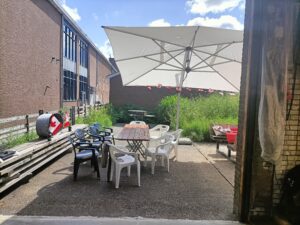 Backyard of the brewery with Canadian flags and bunting.