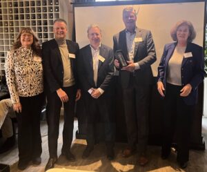 Julie Allen (NCCC), Lex Smaal (Stigterstaal), Ambassador Adsett, Gerben Cozijnsen (Stigterstaal) and Melanie ter Meulen (NCCC) pose with the Award