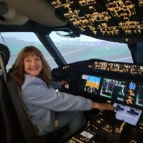 IMG20260521174101 Julie Allen in a flight simulator.