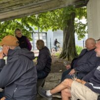 pic 12 Group of people listening to a talk about the city vineyard and tasting some of the wine