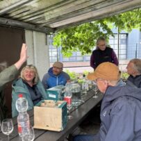 pic 13 Group of people listening to a talk about the city vineyard and tasting some of the wine