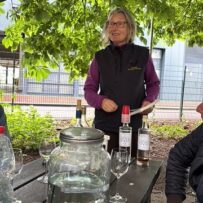 pic 4 a lady talking about the city vineyard